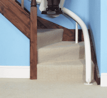 A drop nose stairlift rail