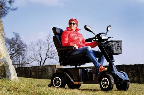 a lady on the Sterling S700 mobility scooter