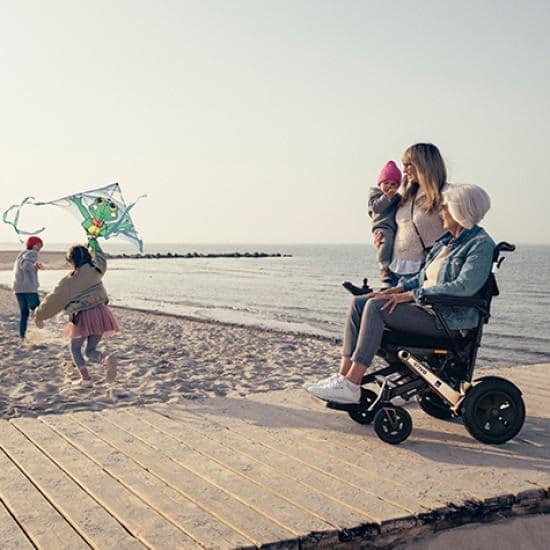 Erivo folding power chair at beach