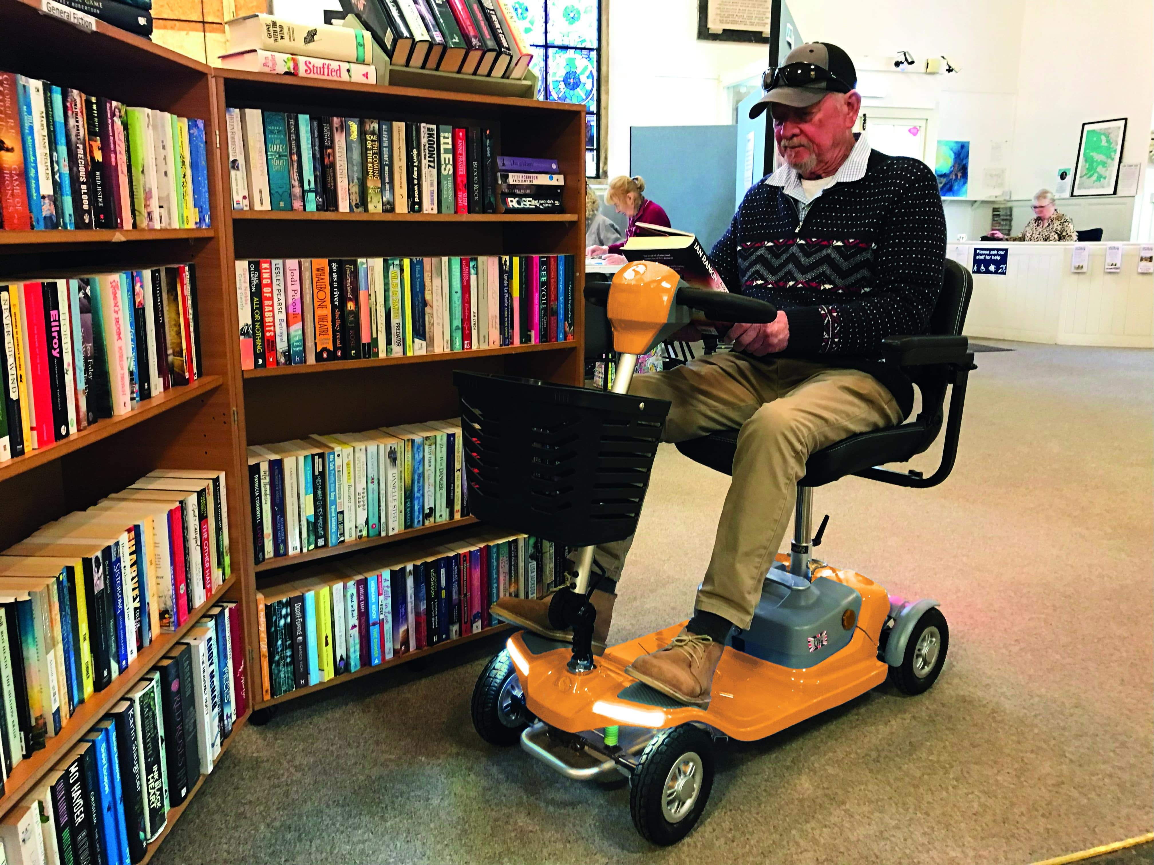 Rascal Luxe mobility scooter in library