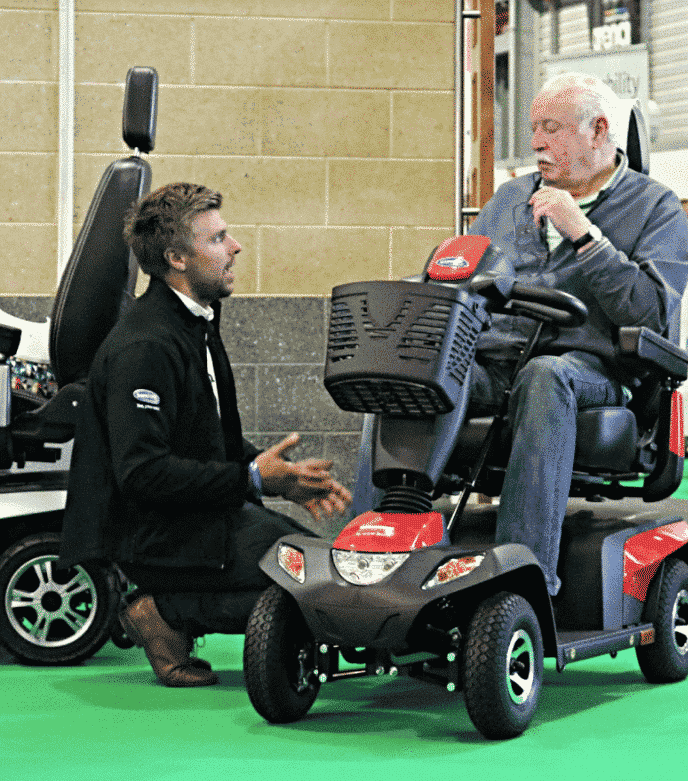 Ben Upson talking to a visitor at The Motability One Big Day Event