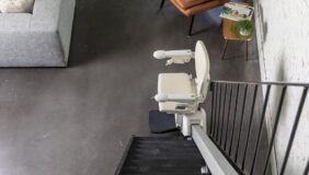 Handicare 1100 Stairlift at the bottom of the stairs