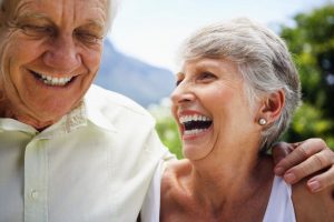 Happy Couple With Wheelchair