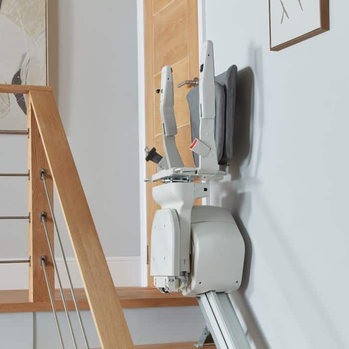 Ergo straight stairlift top of stairs folded away