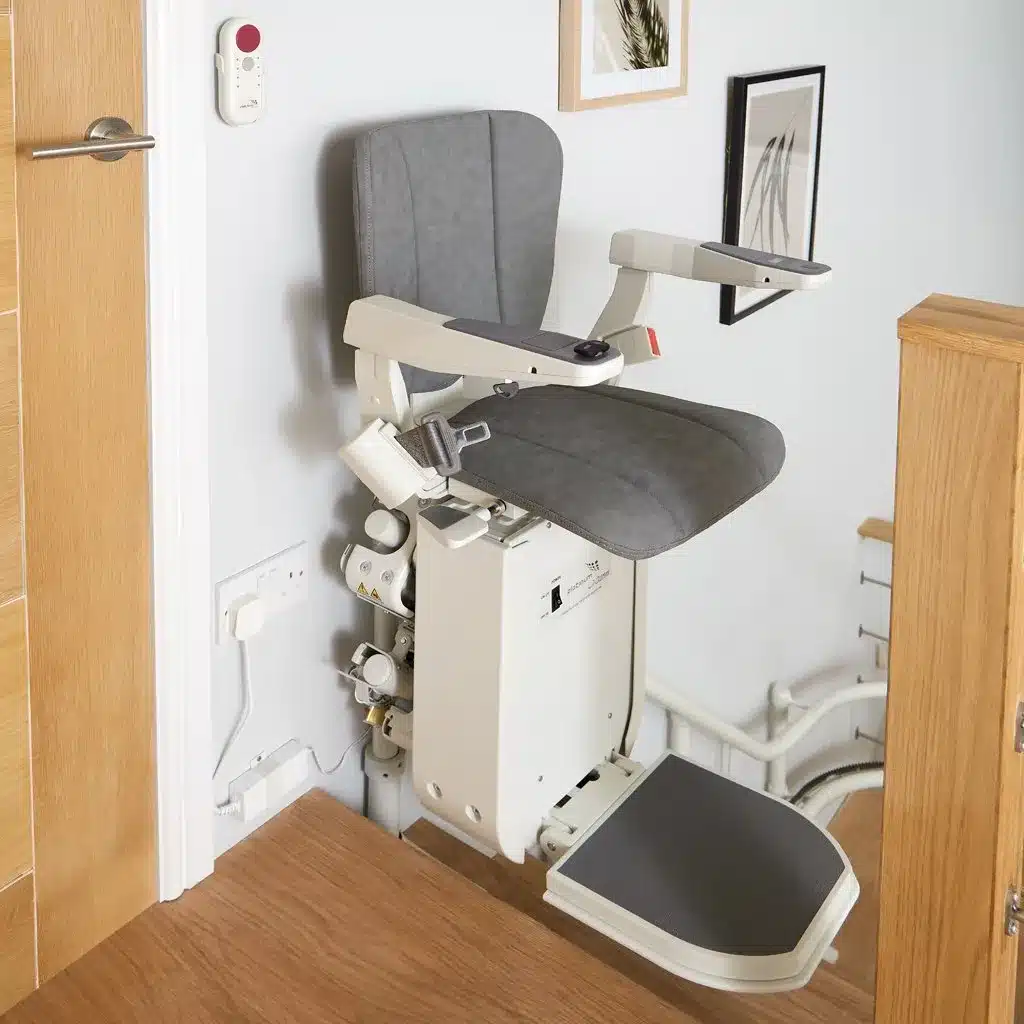 ergo curve stairlift at the top of the stairs