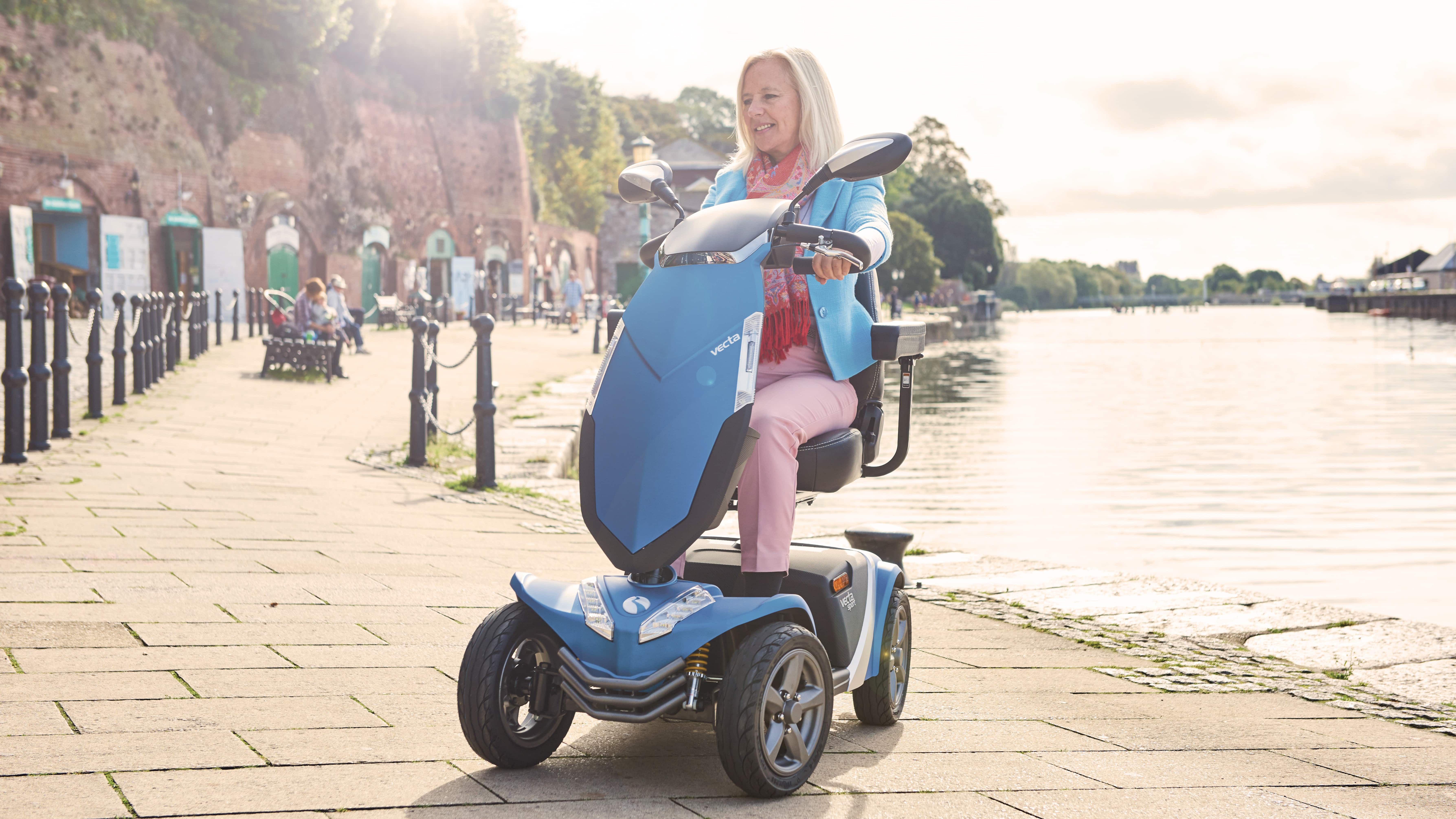 a woman on a mobility scooter